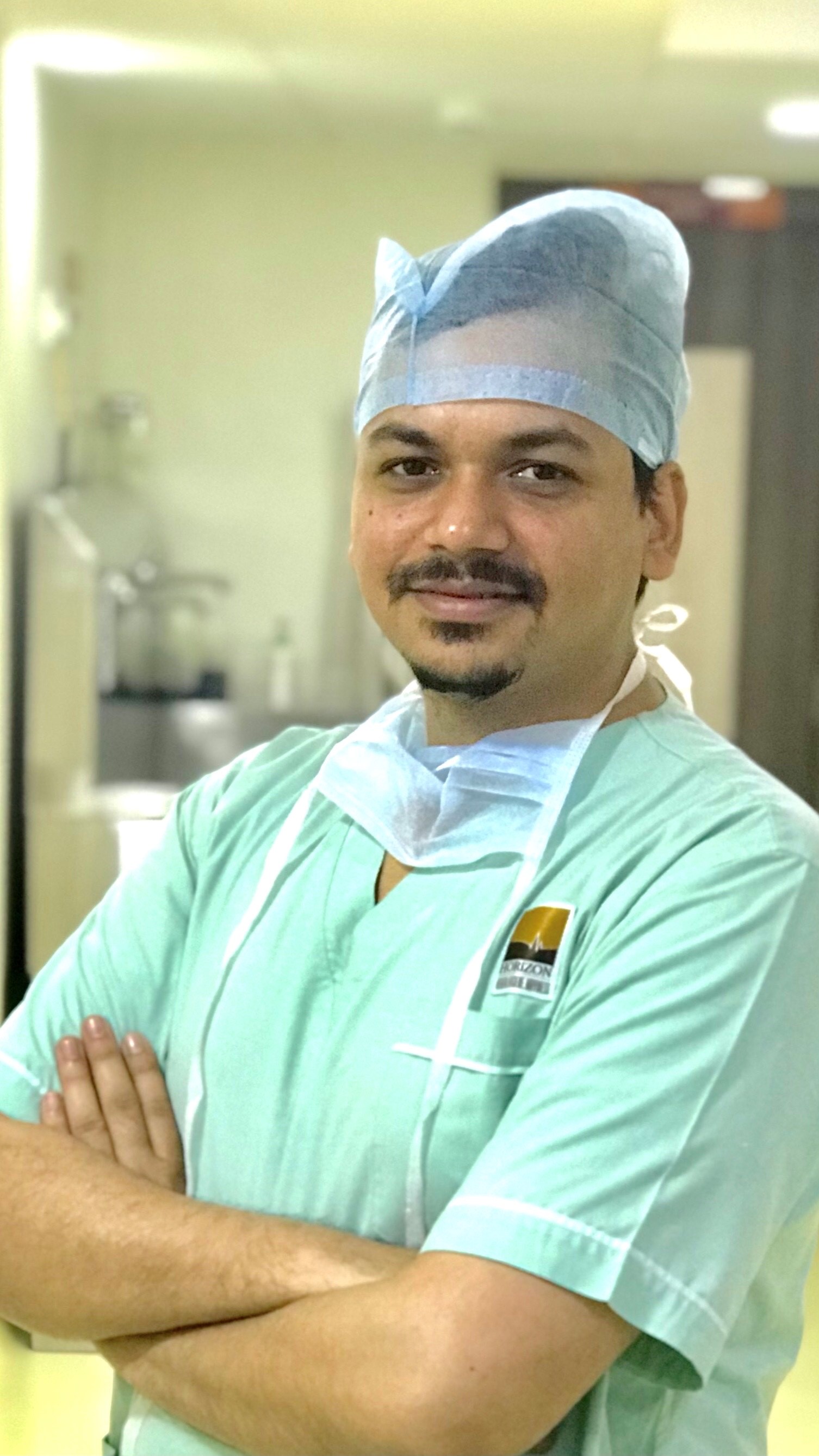 Dr.   Manish S.  Tiwari